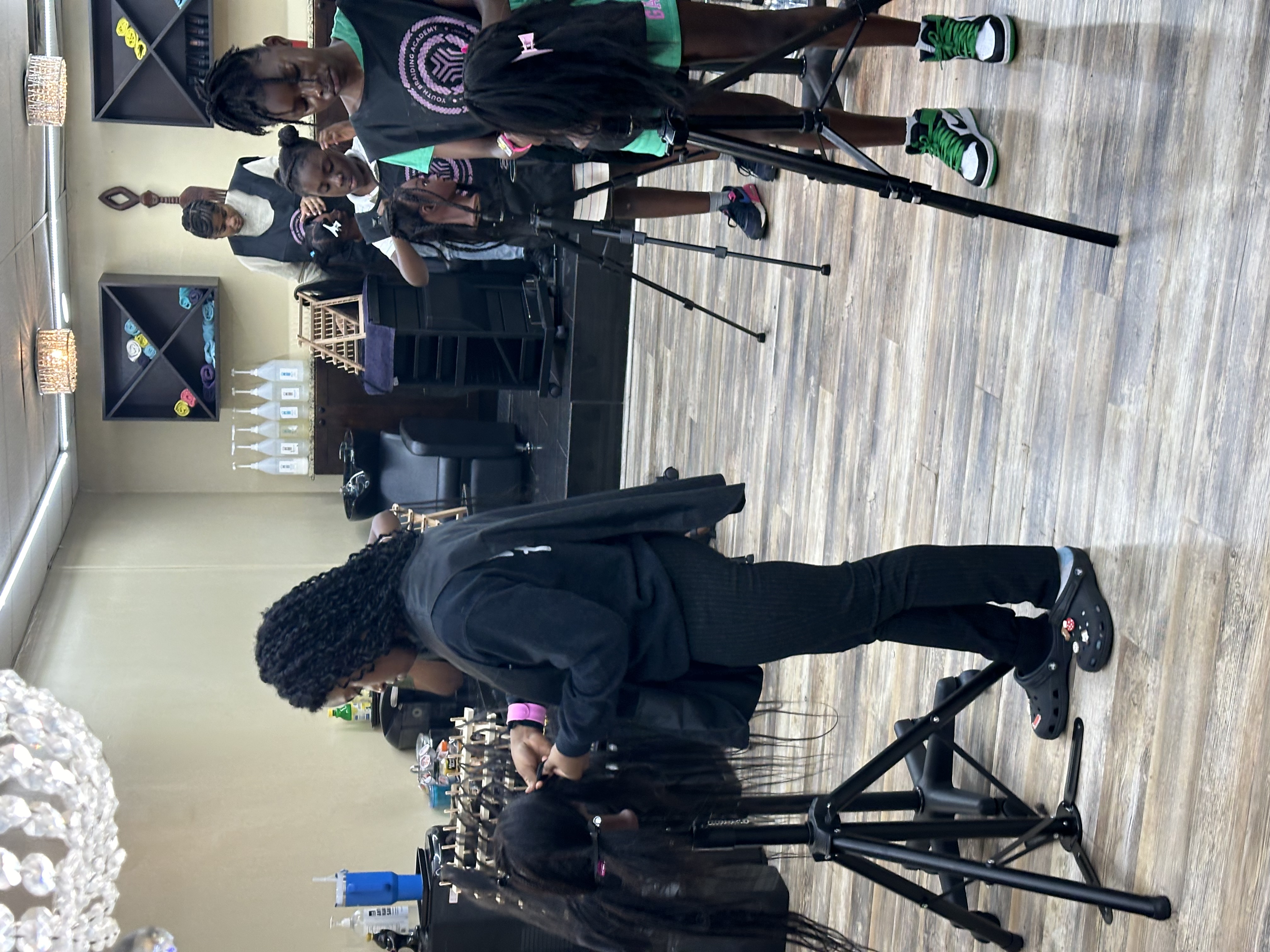 Students practicing braiding in class